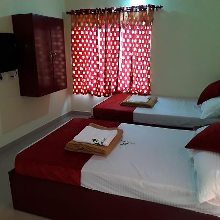 Hotel Ganga Residency Kuzhittura Kültér fotó