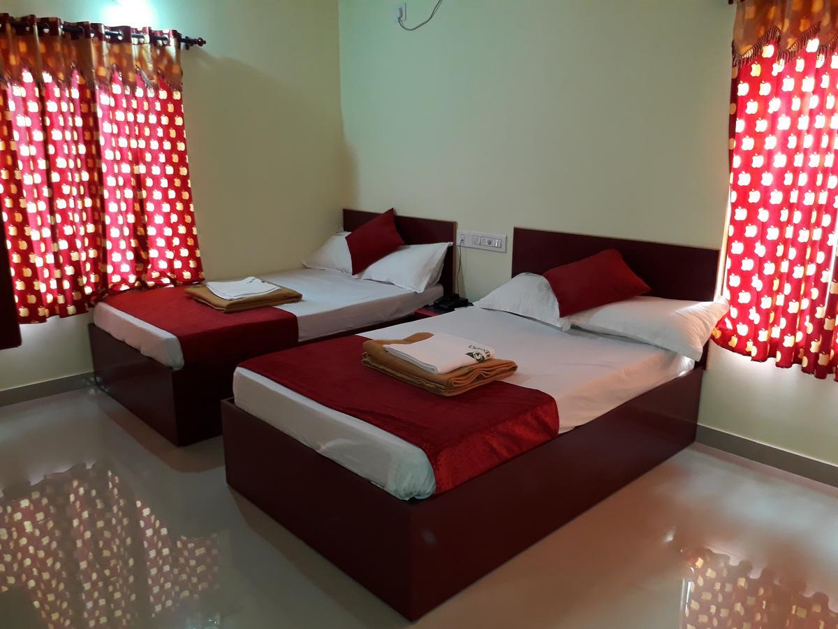 Hotel Ganga Residency Kuzhittura Kültér fotó